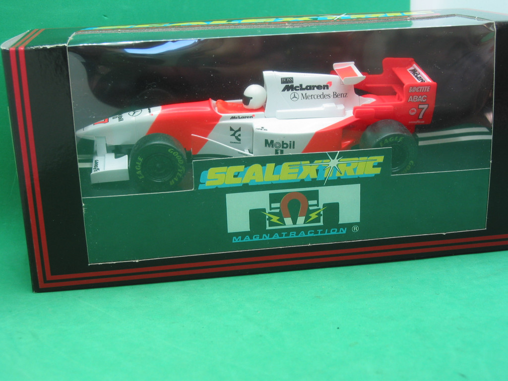 ミニカー McLaren MP4/12 + サスペンションスプリング ミニカー McLaren MP4/12 + サスペンションスプリング ミニカー