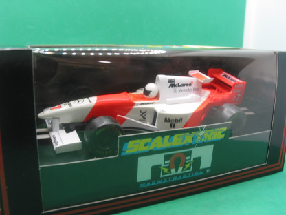 SCALEXTRIC C585  MCLAREN MERCEDES MP4/10 #7  (LACQUER HAS SOME SLIGHT DIS COLOUR IN PLACES) MINT BOXED IN ORIGINAL CRISP BLACK BOX WITH YELLOW END LABEL COLLECTORS CONDITION - Image 4