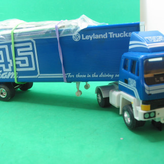 SCALEXTRIC T45 LEYLAND ROAD TRAIN nice condition - the white base of the truck is still white and not faded - chrome is on its sprue truck appears to be unrun - the box is included but would describe only as fair