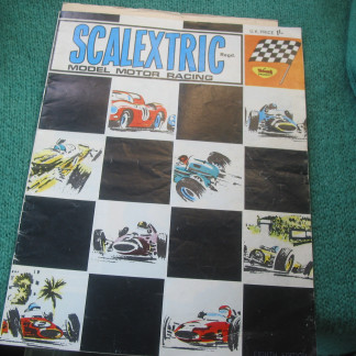 SCALEXTRIC  CATALOGUE 8th     EDITION  1967 with price list some crease but complete