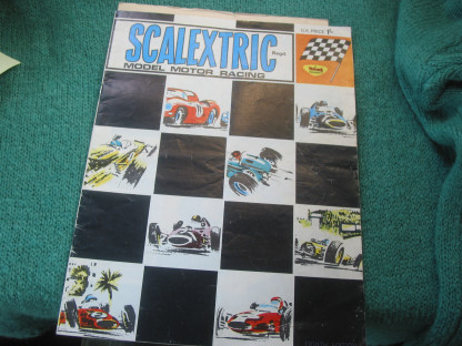 SCALEXTRIC  CATALOGUE 8th     EDITION  1967 with price list some crease but complete