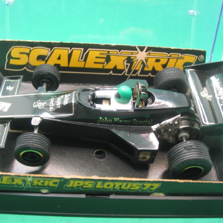 DELETED SCALEXTRIC C126 JPS LOTUS 77 GOLD LINE GOES RIGHT ACROS THE COCKPIT  REPRO REAR TYRES SO RUNS  WELL VG+ B   #5 green drivers helmet