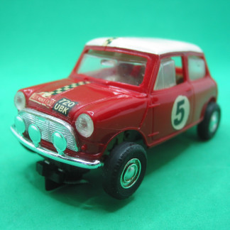 VINTAGE TRIANG SCALEXTRIC C7 MINI COOPER RED #5 tiny stress mark split at the to of the windscreen, very common on these cars , runs well very good unboxed