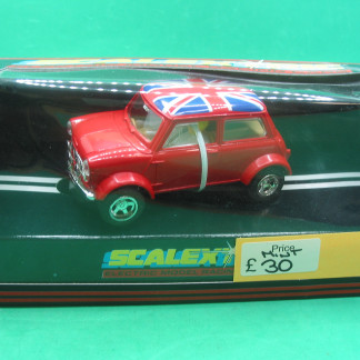SCALEXTRIC C398 MINI RED  MINT BOXED IN ORIGINAL CRISP BLACK BOX WITH YELLOW END LABEL COLLECTORS CONDITION