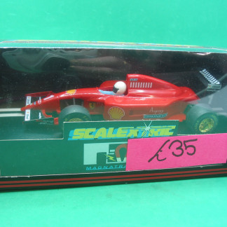 SCALEXTRIC C2011 FERRARI 643 RED #1 MINT BOXED IN ORIGINAL CRISP BLACK BOX WITH YELLOW END LABEL COLLECTORS CONDITION