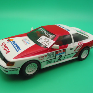 SCALEXTRIC SCX TOYOTA CELICA REPSOL 4X4 WORKING LIGHTS VERY GOOD UNBOXED