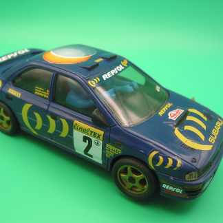 SCX (SPANISH SCALEXTRIC) SUBARU 4X4 WORKING LIGHTS some paint detail on the rear lights very good unboxed bargain