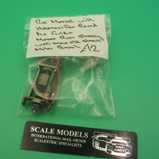 ORIGINAL SCALEXTRIC SPARE RX MOTOR  WITH HARNESS FOR ROUND PIN GUIDE MOTOR RUNS STRONG WITH 'NEW OLD STOCK' MOTOR BRUSHES (48)