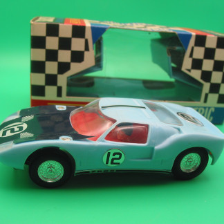 VINTAGE TRIANG SCALEXTRIC C77 FORD GT40 BLUE #12 RUNS WELL OUTSTANDING CONDITION WITH ORIGINAL BOX AND INSTRUCTIONS  - ONE SLIGHT TEAR IN THE CELLOPHANE, NOT MANY RACE TUNED BOXES SURVIVE IN THIS CONDITION