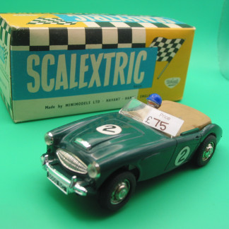 VINTAGE TRIANG SCALEXTRIC C74 AUSTIN HEALEY GREEN REPRO BUMPERS AND NEW TYRES LOOKS AND RUNS WELL - ORIGINAL BOX IS SHARP AND CRISP WITH INSTRUCTIONS  VG+b