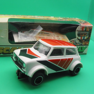 VINTAGE SCALEXTRIC C110  MINI 1275GT WHITE - THIS CAR IS SNOW WHITE - WITH PERFECT TAMPO PRINT  ORIGINAL BOX (HAS HAD NEW CELLOPHANE) WITH INSTRUCTIONS SPARE BRAID AND DECAL SHEET  EXCELLENT BOXED