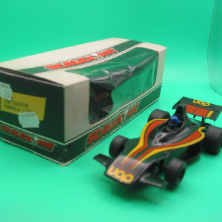VINTAGE SCALEXTRIC C105 UOP SHADOW NICE CONDITION CAR WITH EXCELLENT ORIGINAL BOX - EVEN THE CELLOPHANE IS ORIGINAL - COMES WITH ITS INSTRUCTION SHEET AND DECAL SHEET, PLUS SMALL NUMBER ROUNDALS AND SPARE BRAID  - EXCELLENT