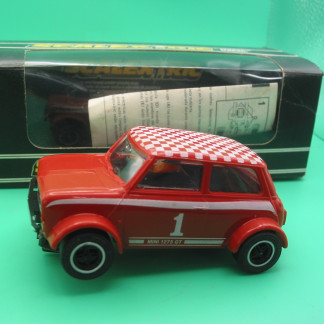 VINTAGE  SCALEXTRIC  C122 MINI 1275 GT RED  MINT NEW CAR NOT RUN ORIGINAL BOX INSTRUCTIONS AND SPARE BRAID - BOX HAS HAD NEW CELLOPHANE  CAR MINT BOX VG