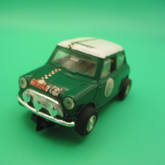 VINTAGE SCALEXTRIC C7 MINI COOPER TYPE 2 WITH LARGER WHEELS NO SPOT LIGHT NICE CONDITION, all original decals Front bumper is new as are the rear tyres vg+ unboxed