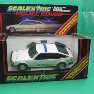 VINTAGE SCALEXTRIC C284 POLICE ROVER working siren and flashing roof light - mirrors still on the sprue - original box and instructions box has has new cellophane, had some slight use the car is nice and white with no marks vgb