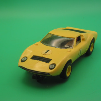 VINTAGE TRIANG SCALEXTRIC C17 LAMBORGHINI MURA MADE IN USSR VERSION  a lighter yellow than the UK version - also yellow wheels - New Rear Tyres fitted so runs well, slight scrathc on front wing  vg unboxed